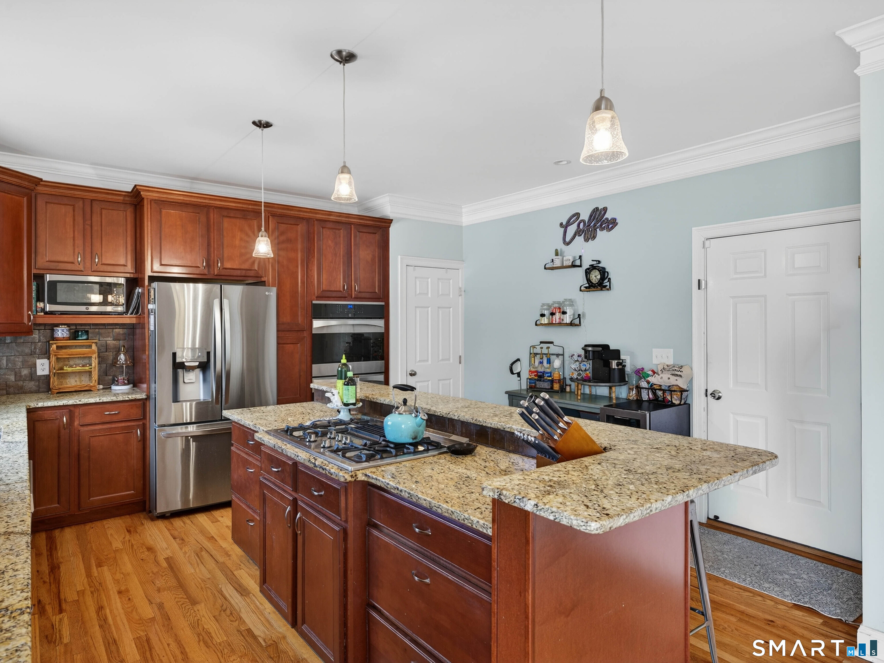 6 Constance Street New Haven, CT 06512 - Photo 14 of 39 a kitchen with granite countertop a sink cabinets stainless steel appliances and a center island
