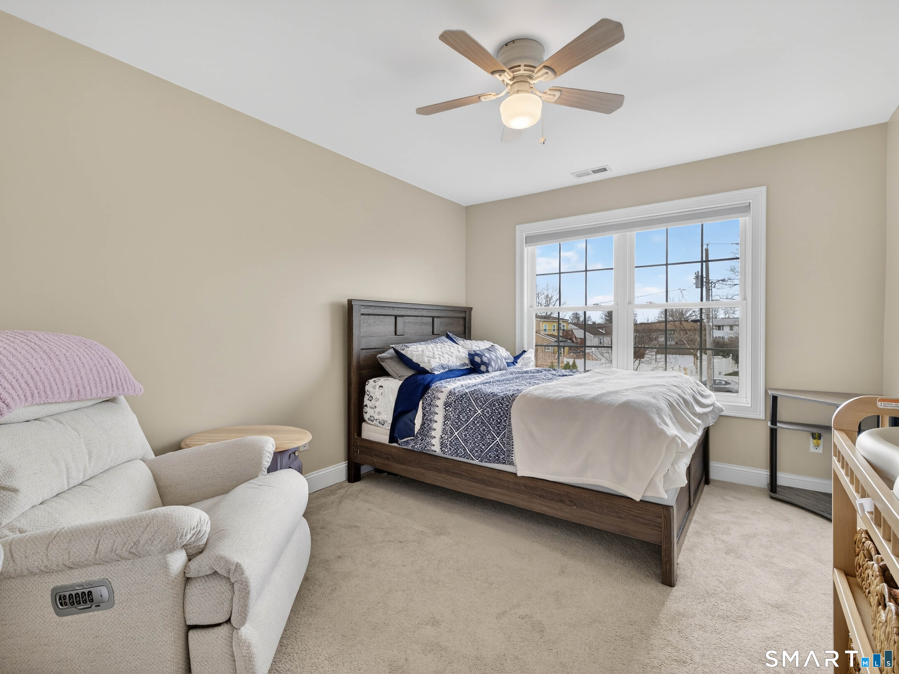 6 Constance Street New Haven, CT 06512 - Photo 26 of 39 a bedroom with a bed couch and window