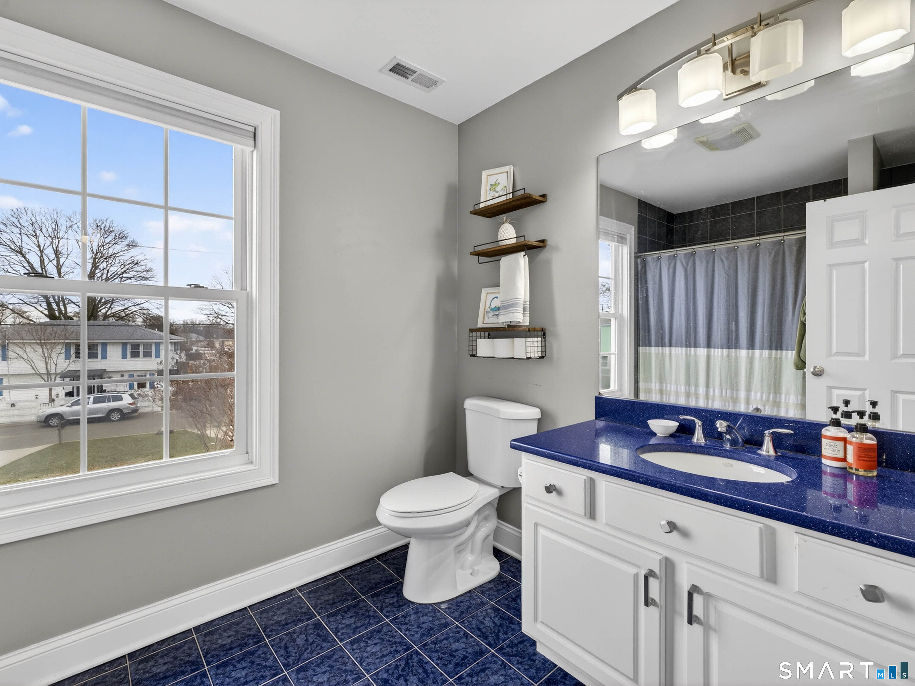 6 Constance Street New Haven, CT 06512 - Photo 30 of 39 a bathroom with a sink a toilet and a mirror