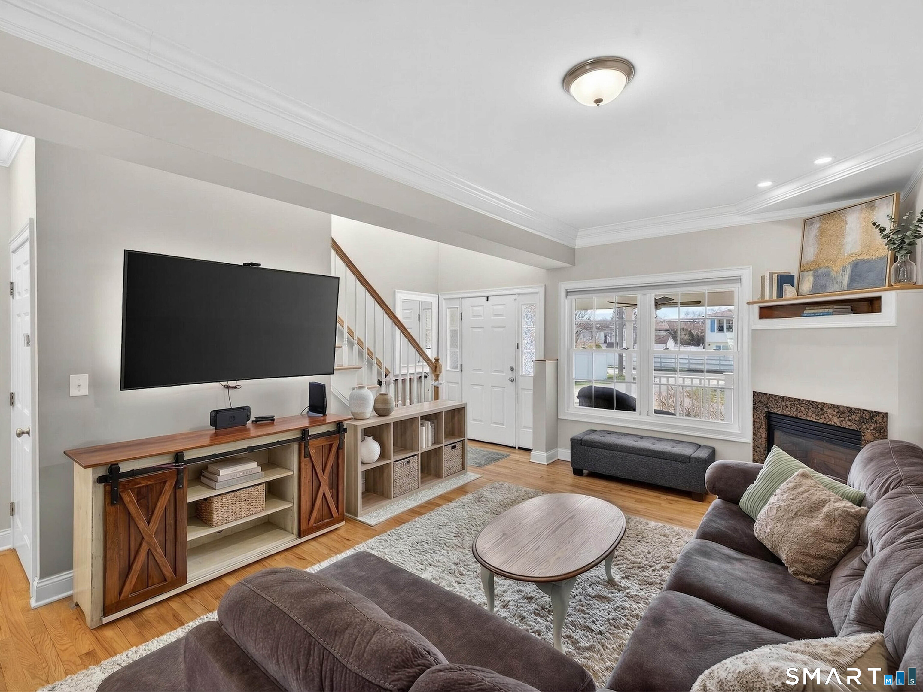 6 Constance Street New Haven, CT 06512 - Photo 8 of 39 a living room with furniture and a flat screen tv