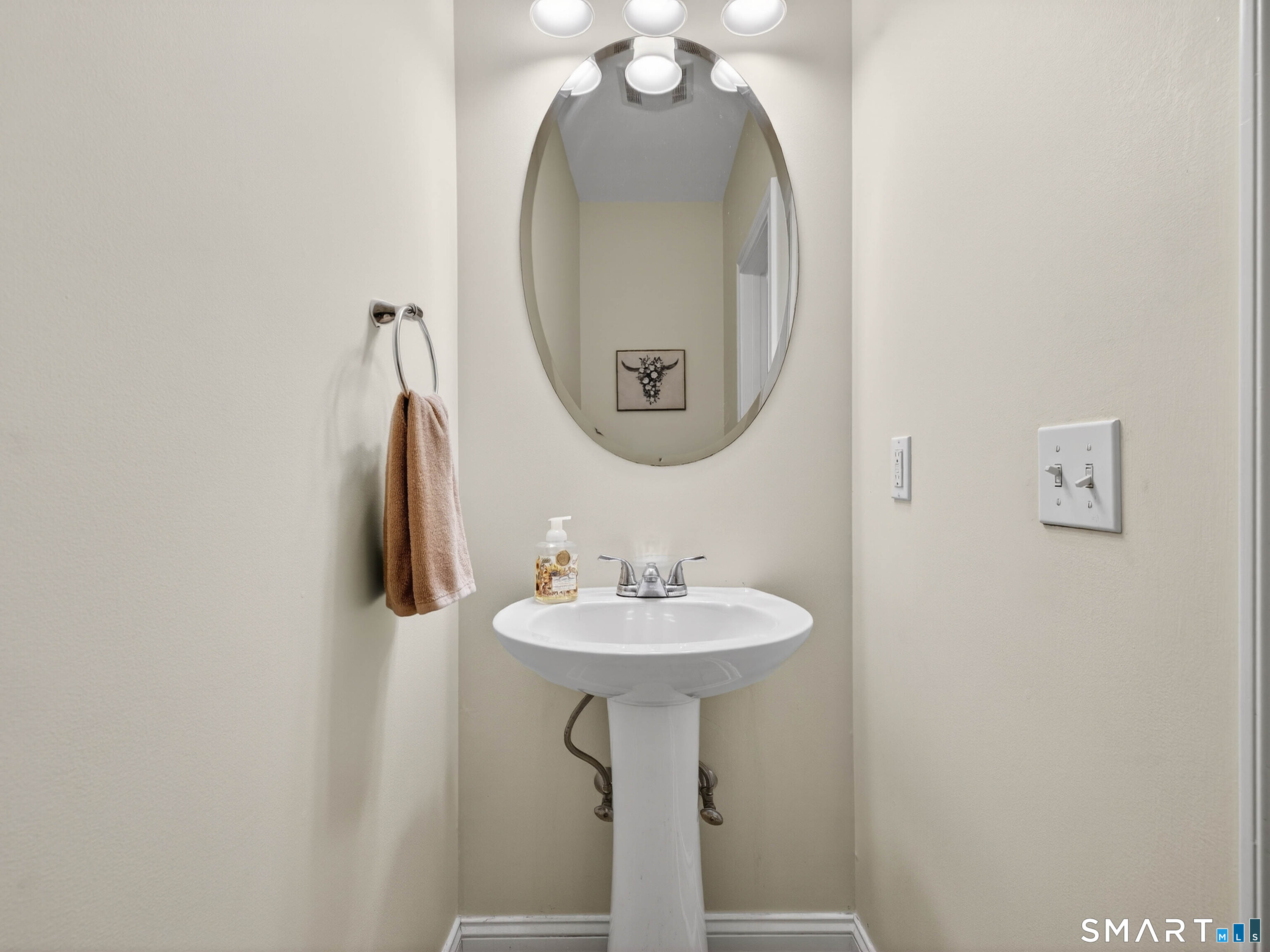 6 Constance Street New Haven, CT 06512 - Photo 9 of 39 a bathroom with a sink and a mirror