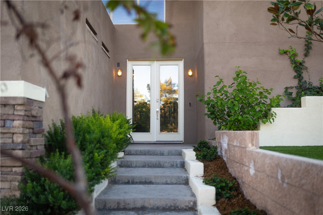 2817 High View Drive Henderson, NV 89014 - Photo 11 of 77 Entrance to property featuring stucco siding and french doors
