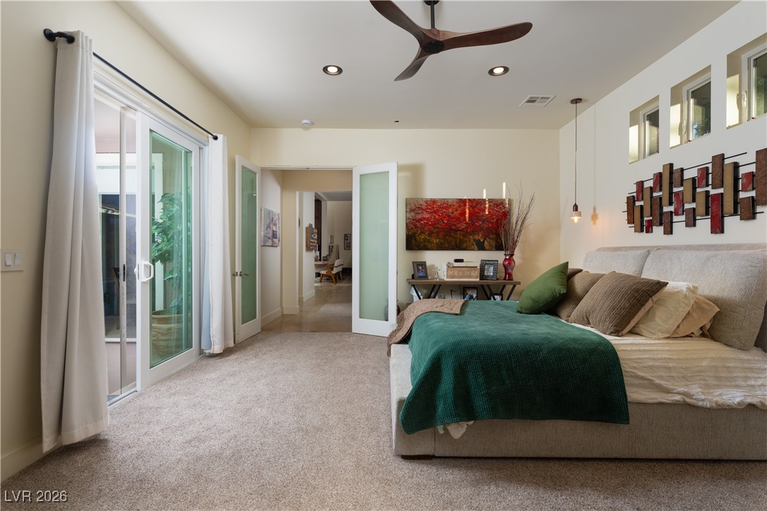 2817 High View Drive Henderson, NV 89014 - Photo 37 of 77 Bedroom with carpet floors, access to exterior, ceiling fan, recessed lighting, and french doors