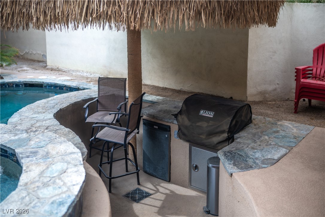 2817 High View Drive Henderson, NV 89014 - Photo 47 of 77 View of patio featuring an outdoor kitchen