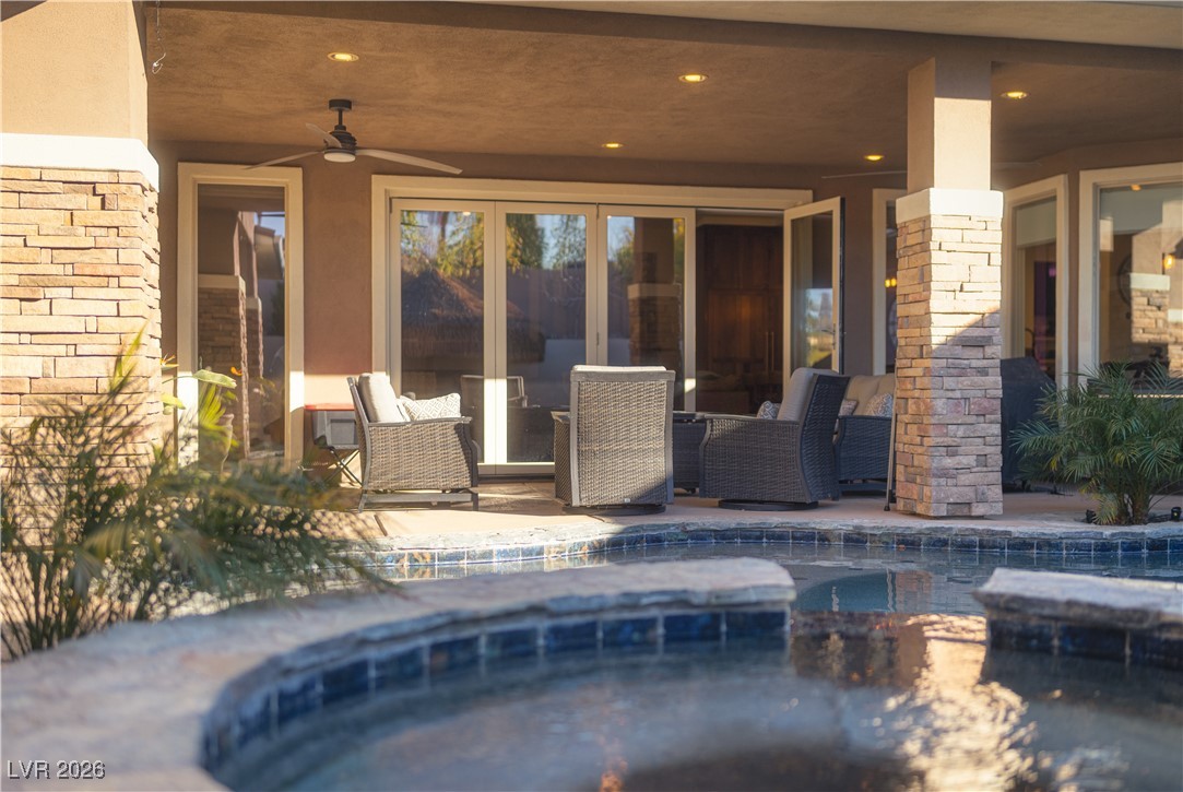 2817 High View Drive Henderson, NV 89014 - Photo 48 of 77 Swimming pool with a patio area and an in-ground hot tub
