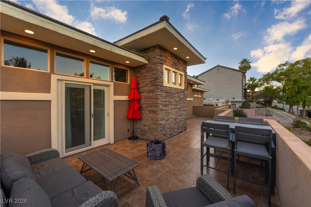 2817 High View Drive Henderson, NV 89014 - Photo 58 of 77 View of patio / terrace featuring an outdoor hangout area