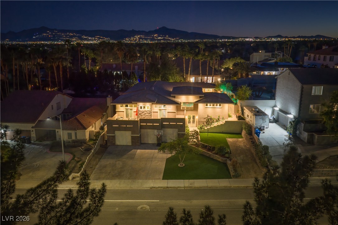 2817 High View Drive Henderson, NV 89014 - Photo 6 of 77 Aerial view at night of a mountain view