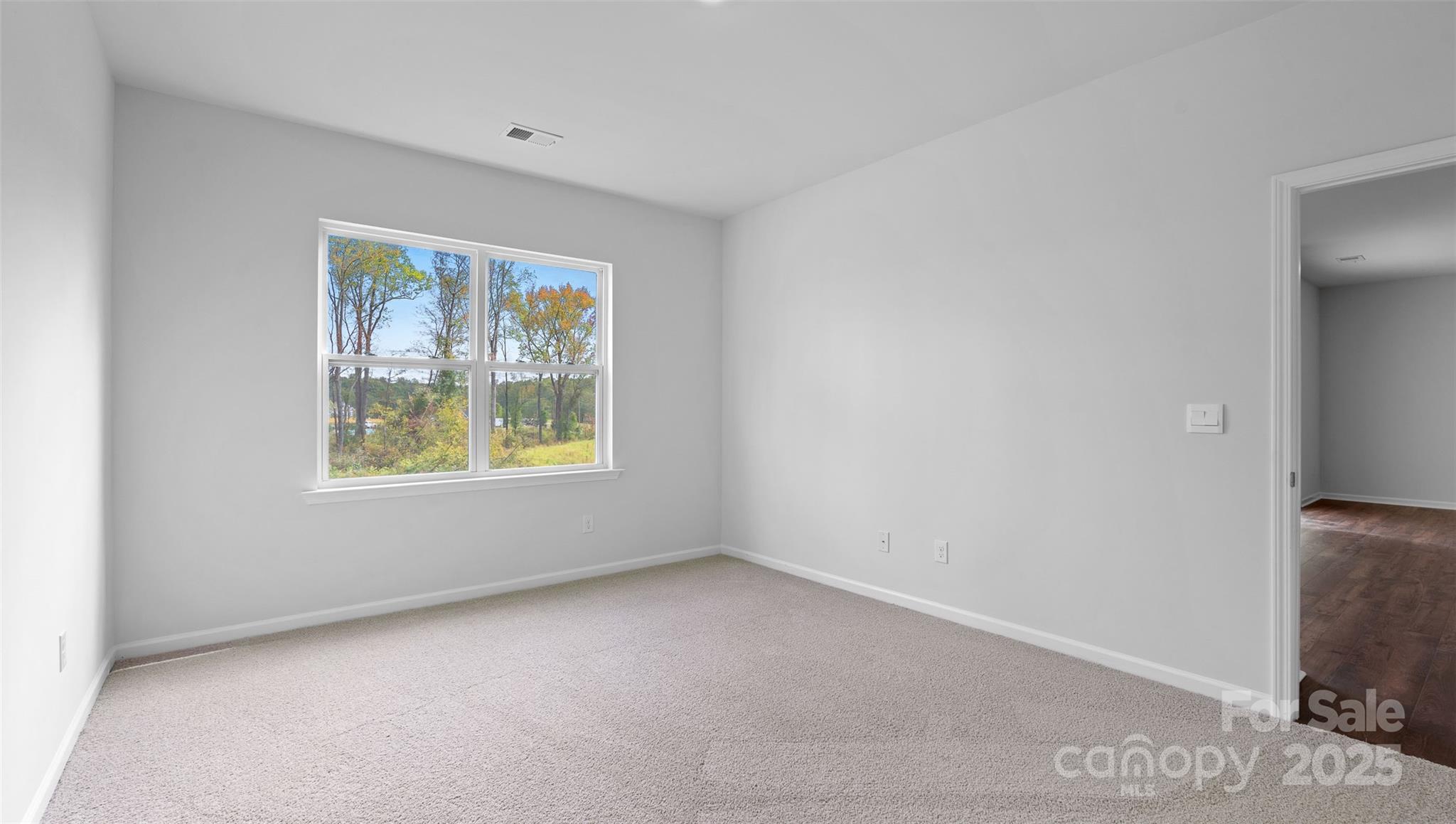 138 Bovine Br Road Fletcher, NC 28732 - Photo 16 of 20 an empty room with windows