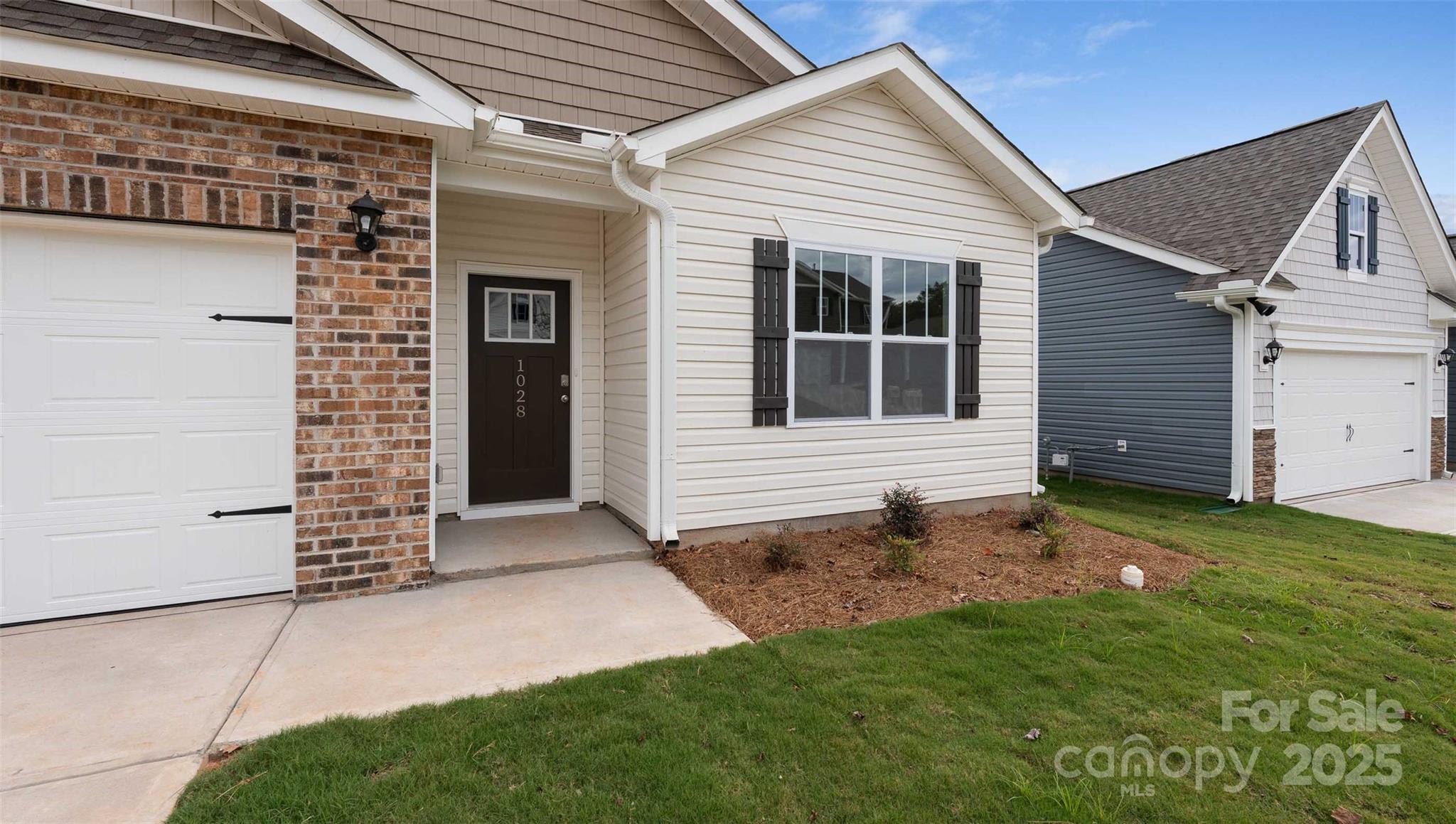 138 Bovine Br Road Fletcher, NC 28732 - Photo 2 of 20 a house with a yard
