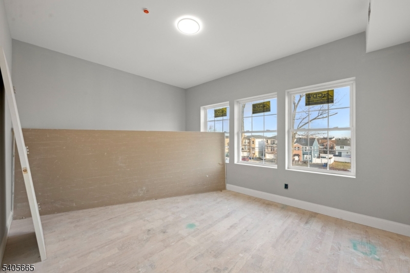 512 South 15th Street Newark, NJ 07103 - Photo 18 of 35 a view of an empty room with a window