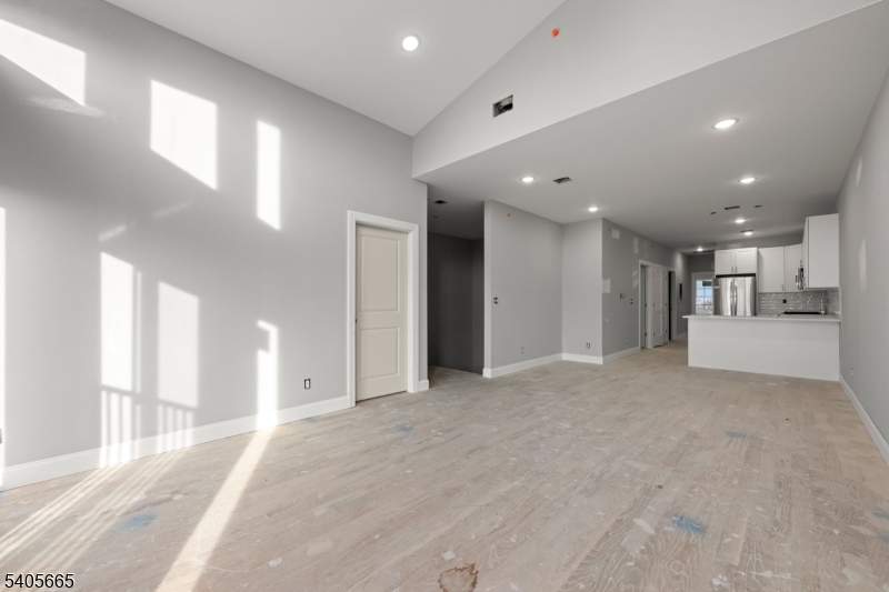 512 South 15th Street Newark, NJ 07103 - Photo 23 of 35 a view of a big room with windows and a living room