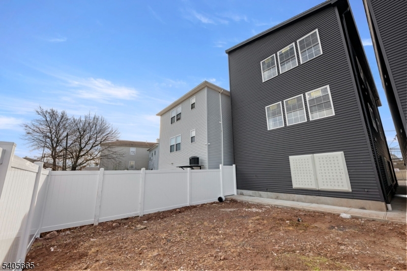 512 South 15th Street Newark, NJ 07103 - Photo 34 of 35 a view of a house with a snow in the background