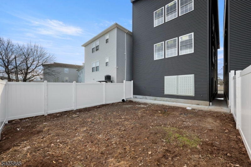 512 South 15th Street Newark, NJ 07103 - Photo 35 of 35 a view of a house with a yard