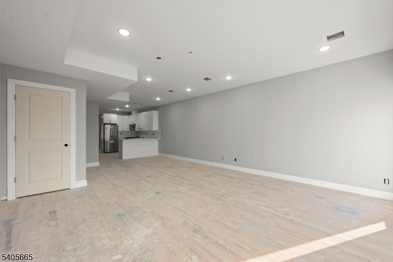 512 South 15th Street Newark, NJ 07103 - Photo 10 of 35 a view of a kitchen with a sink and a refrigerator