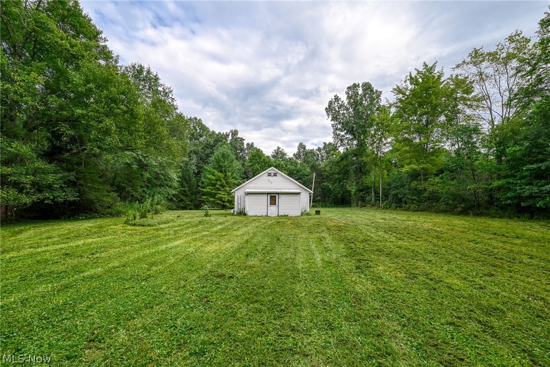 8386 Yale Road Rootstown, OH 44272 - Photo 21 of 46 Expansive green space with a detached outbuilding and mature perimeter trees