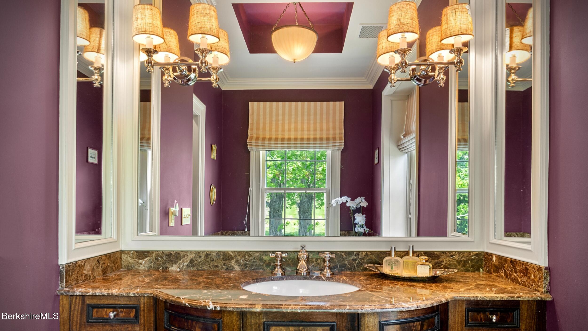 2650 Swamp Road Richmond, MA 01254 - Photo 23 of 49 a bathroom with a granite countertop sink and a mirror