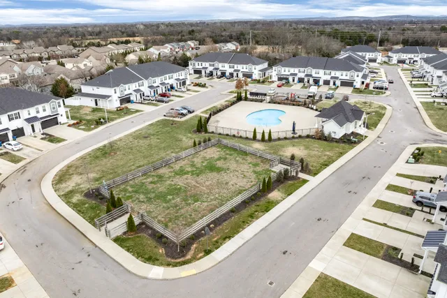 a view of a swimming pool with a terrace