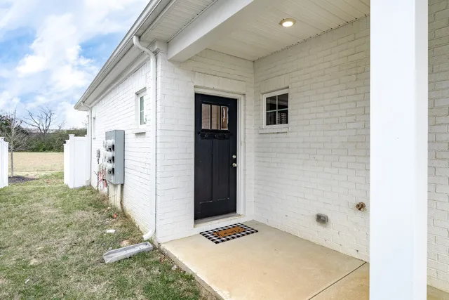 a view of room window and wooden floor
