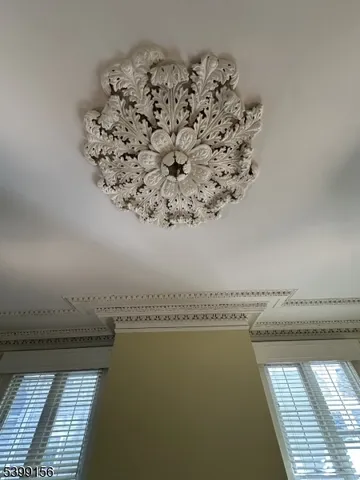 an empty room with a empty space and windows