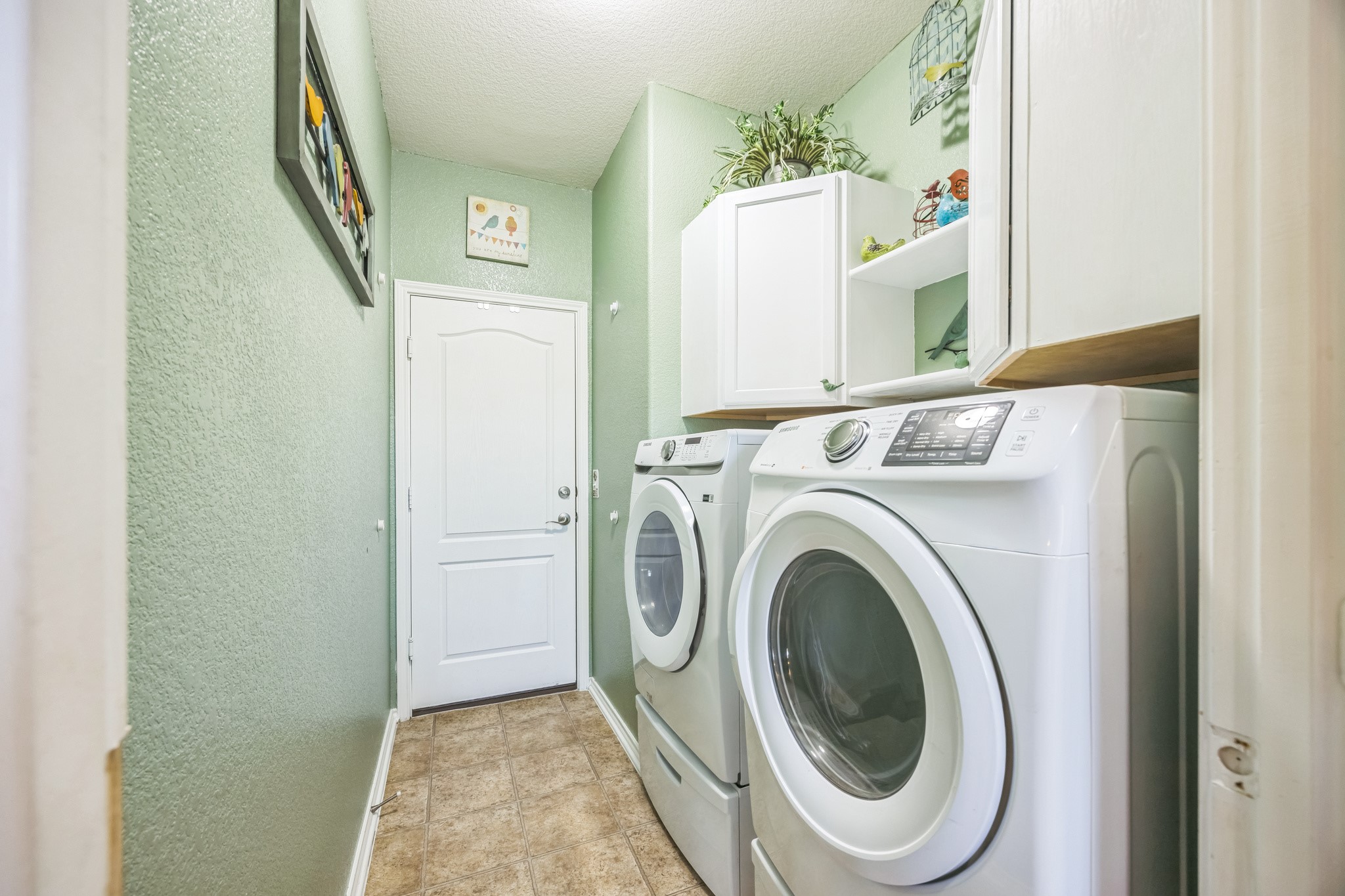 6401 Quinton Drive Austin, TX 78747 - Photo 15 of 29 a utility room with dryer and washer