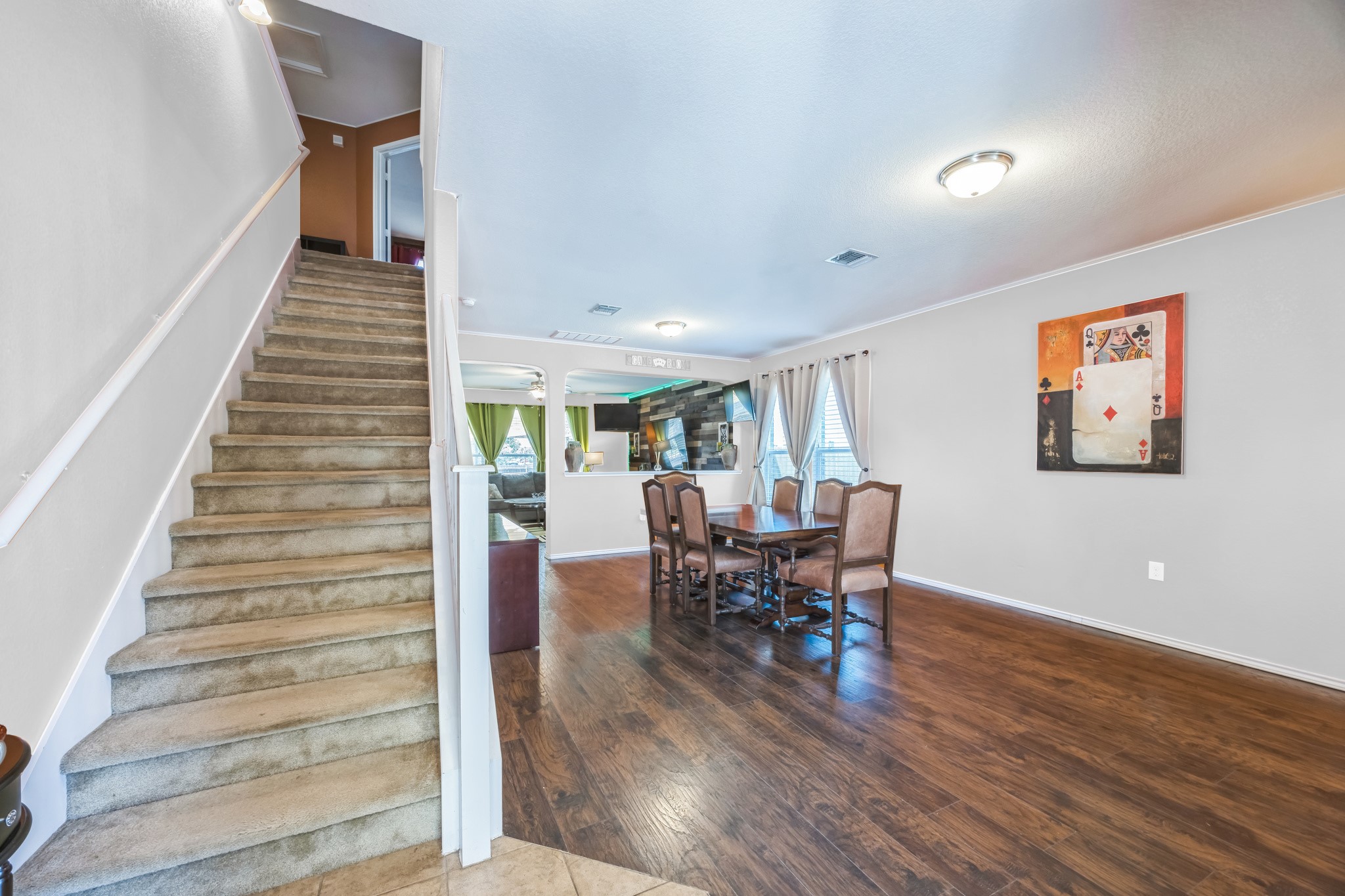 6401 Quinton Drive Austin, TX 78747 - Photo 16 of 29 a view of a dining room with furniture entryway and wooden floor