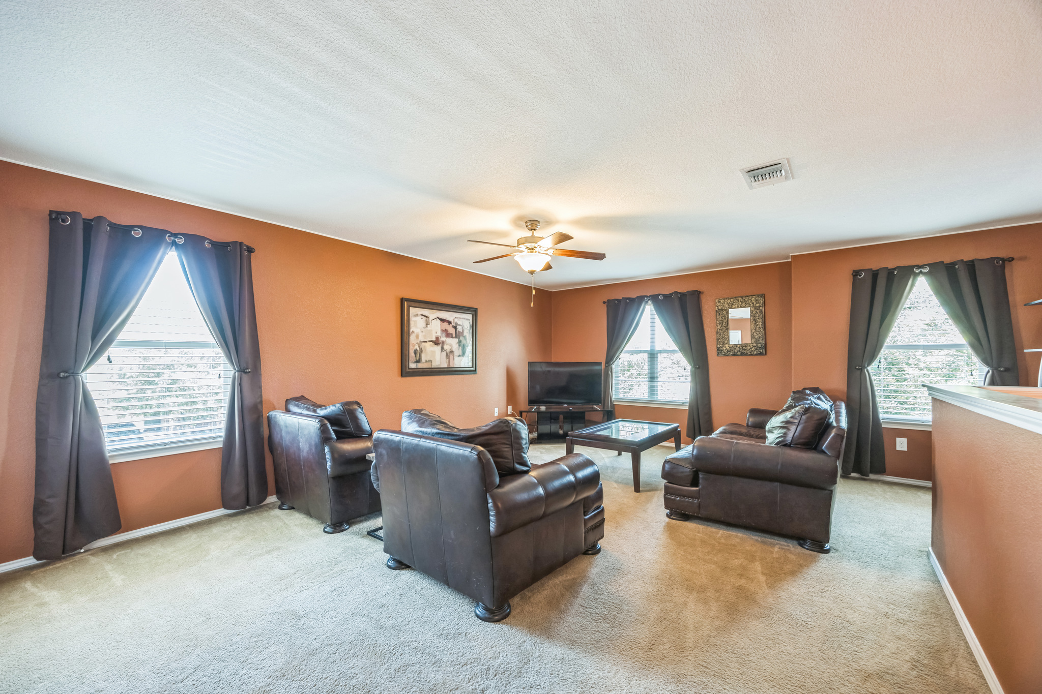 6401 Quinton Drive Austin, TX 78747 - Photo 17 of 29 a living room with furniture and a large window