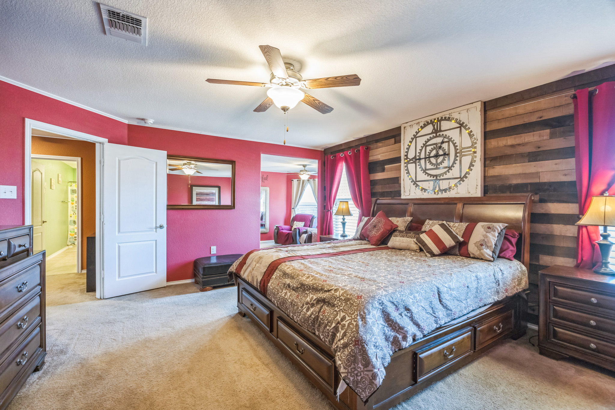 6401 Quinton Drive Austin, TX 78747 - Photo 18 of 29 a bedroom with a bed and a chandelier