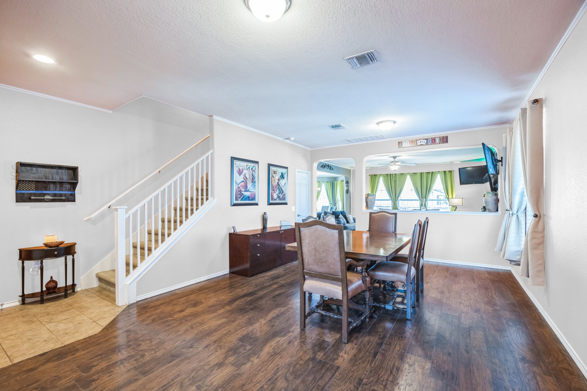 6401 Quinton Drive Austin, TX 78747 - Photo 5 of 29 a view of a dining room with furniture window and wooden floor