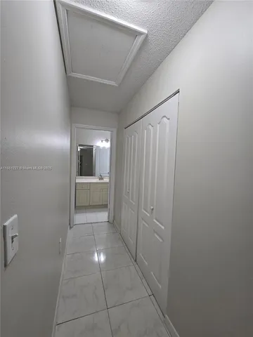 an empty room with fan