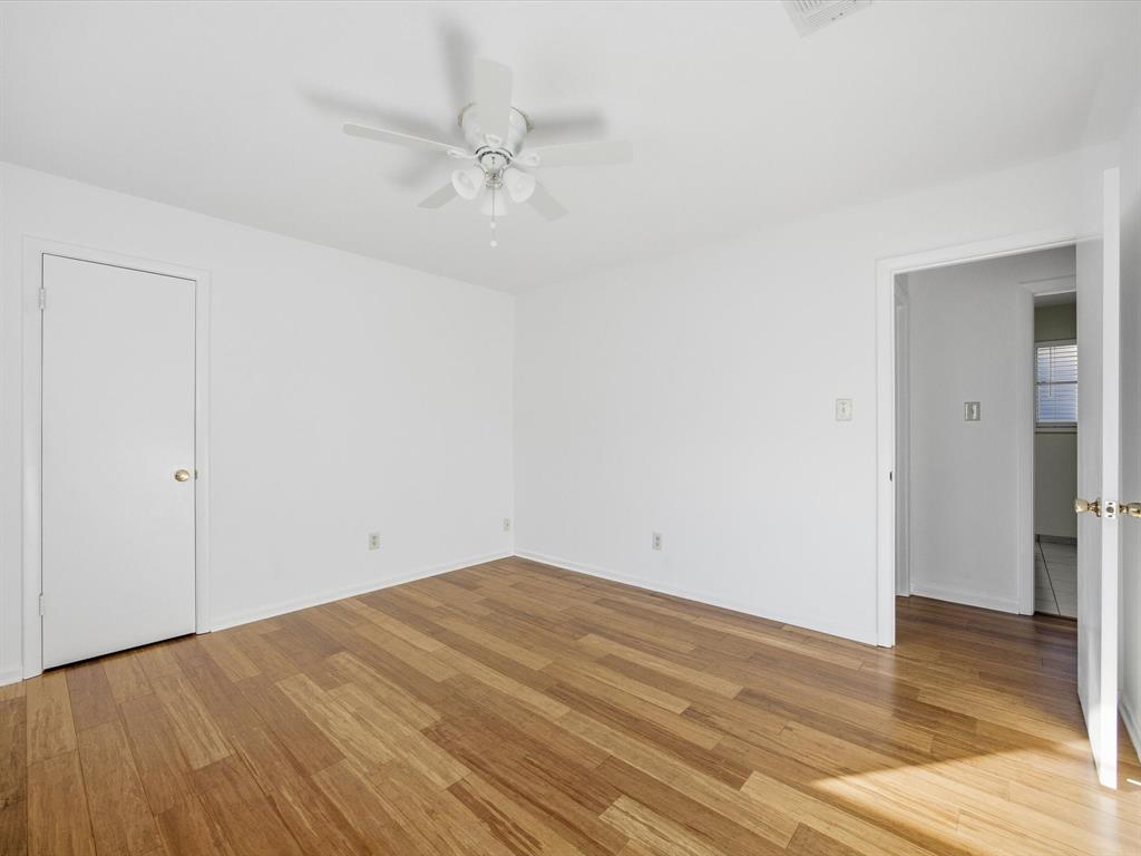 4613 Ranch View Road Fort Worth, TX 76109 - Photo 18 of 24 a view of a room with wooden floor