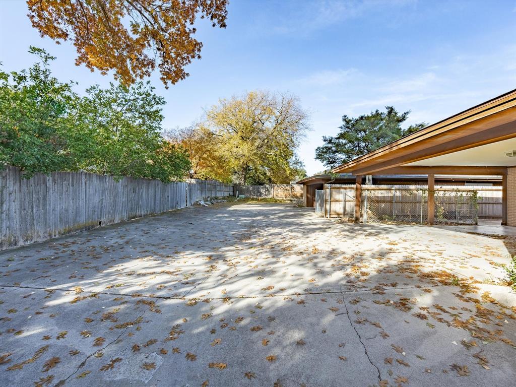 4613 Ranch View Road Fort Worth, TX 76109 - Photo 5 of 24 a view of a house with a yard