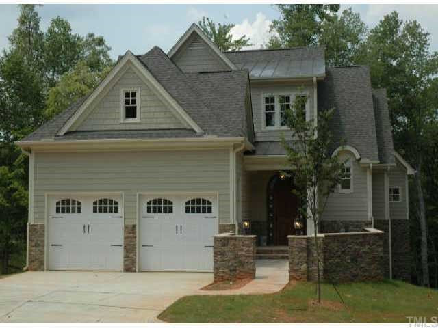 8636 Baybridge Raleigh, NC 27604 - Photo 1 of 10 a front view of a house with garden