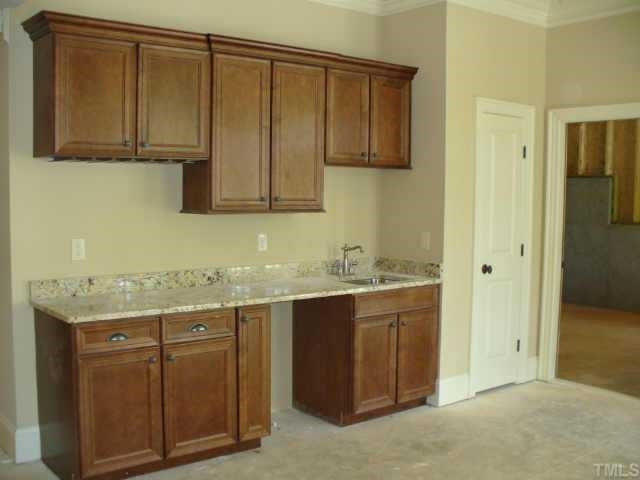 8636 Baybridge Raleigh, NC 27604 - Photo 4 of 10 a room with a sink and cabinets