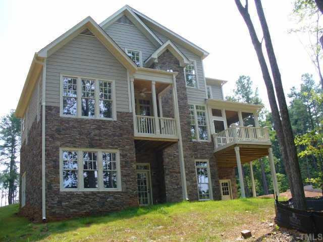 8636 Baybridge Raleigh, NC 27604 - Photo 8 of 10 a front view of a house with a yard