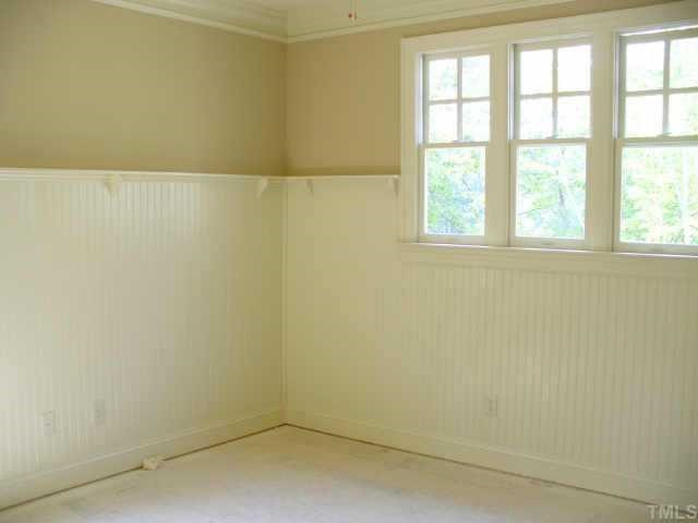 8636 Baybridge Raleigh, NC 27604 - Photo 10 of 10 an empty room with a window