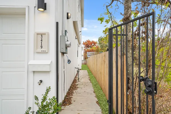 a view of a pathway of a house with wooden floor