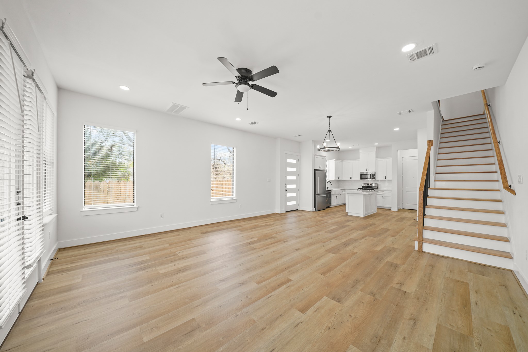 3419 Tuam Street Houston, TX 77004 - Photo 9 of 28 wooden floor in an empty room with a window