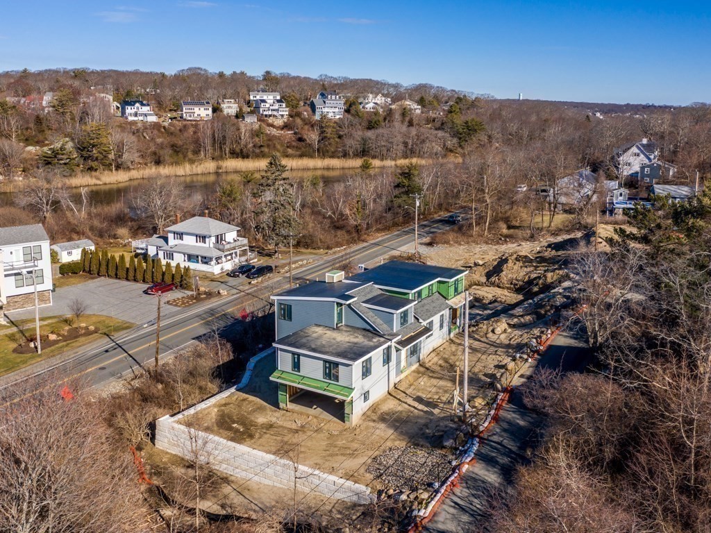 45 Cliff Road, Unit 45A Gloucester, MA 01930 - Photo 13 of 23 an aerial view of a house with a lake view