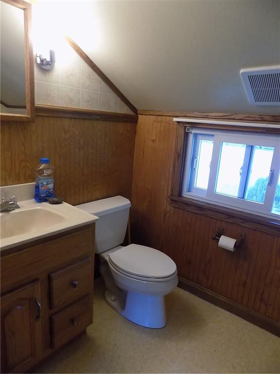 2303 Mercer Road Stoneboro, PA 16153 - Photo 19 of 22 a bathroom with a toilet sink and mirror