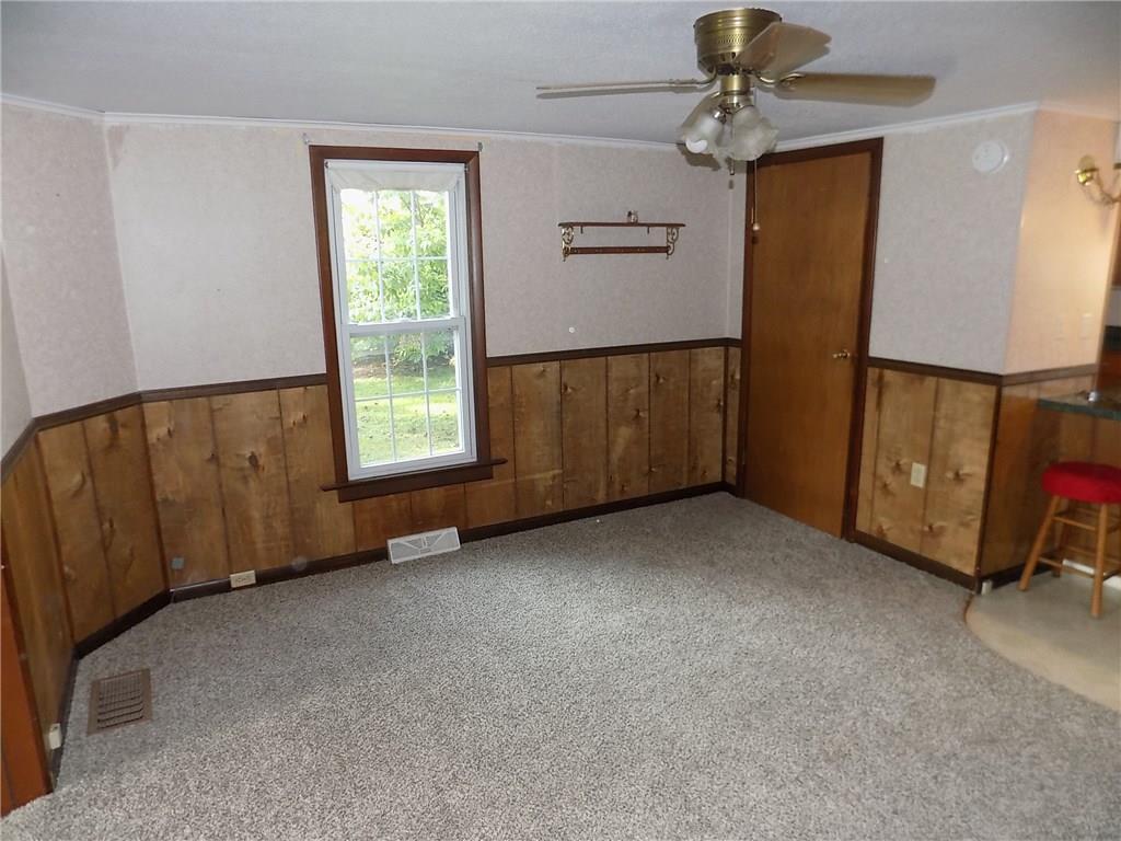 2303 Mercer Road Stoneboro, PA 16153 - Photo 10 of 22 a view of an empty room with a window