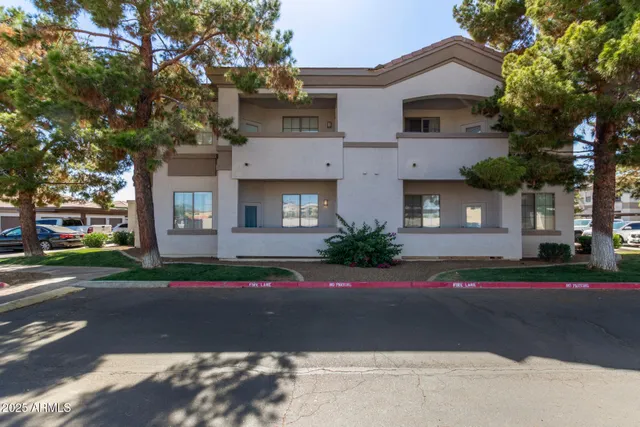 a view of street along with residential houses