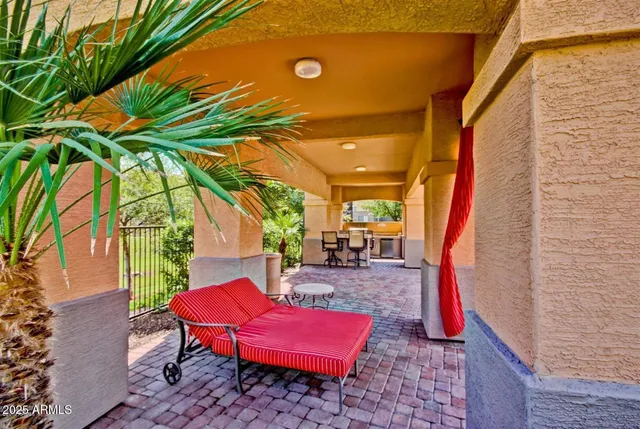 a backyard of a house with seating space