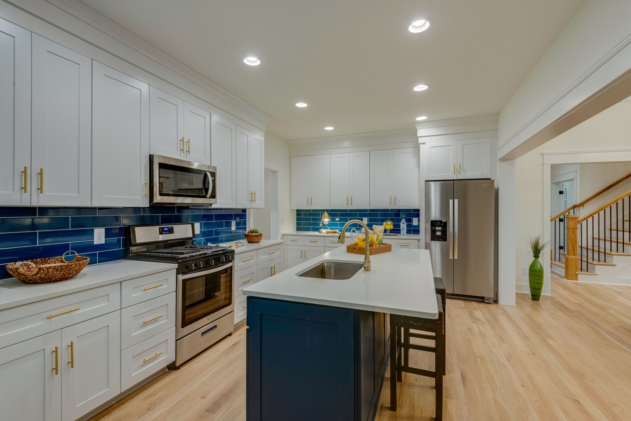 1106 Garton Road Burns, TN 37029 - Photo 15 of 46 a kitchen with a sink a microwave a refrigerator and cabinets
