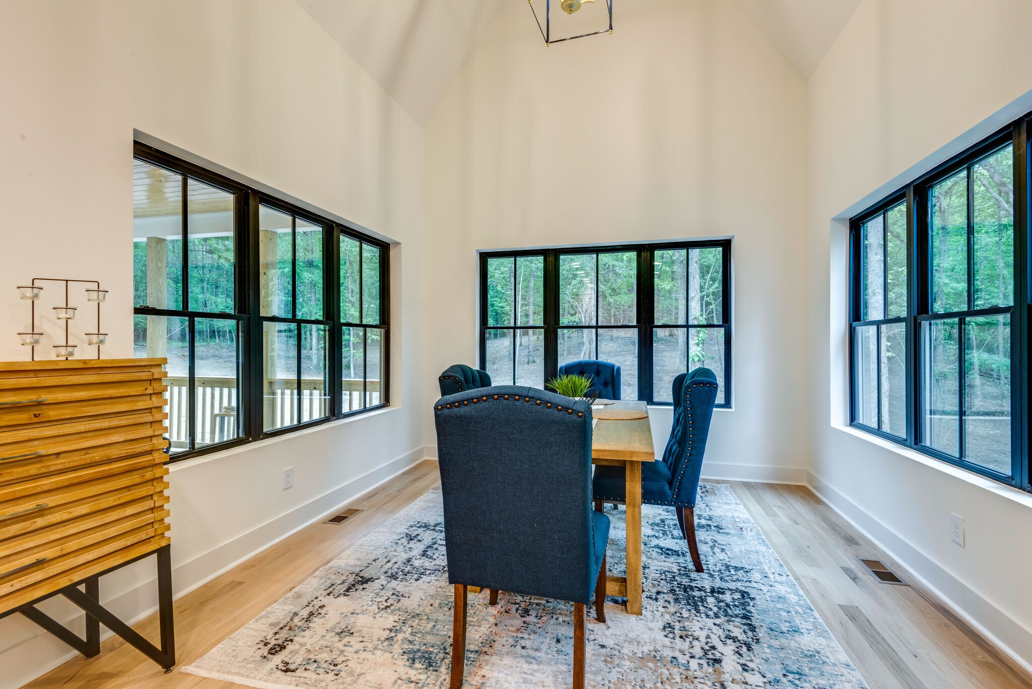 1106 Garton Road Burns, TN 37029 - Photo 17 of 46 a view of a dining room with furniture window and wooden floor