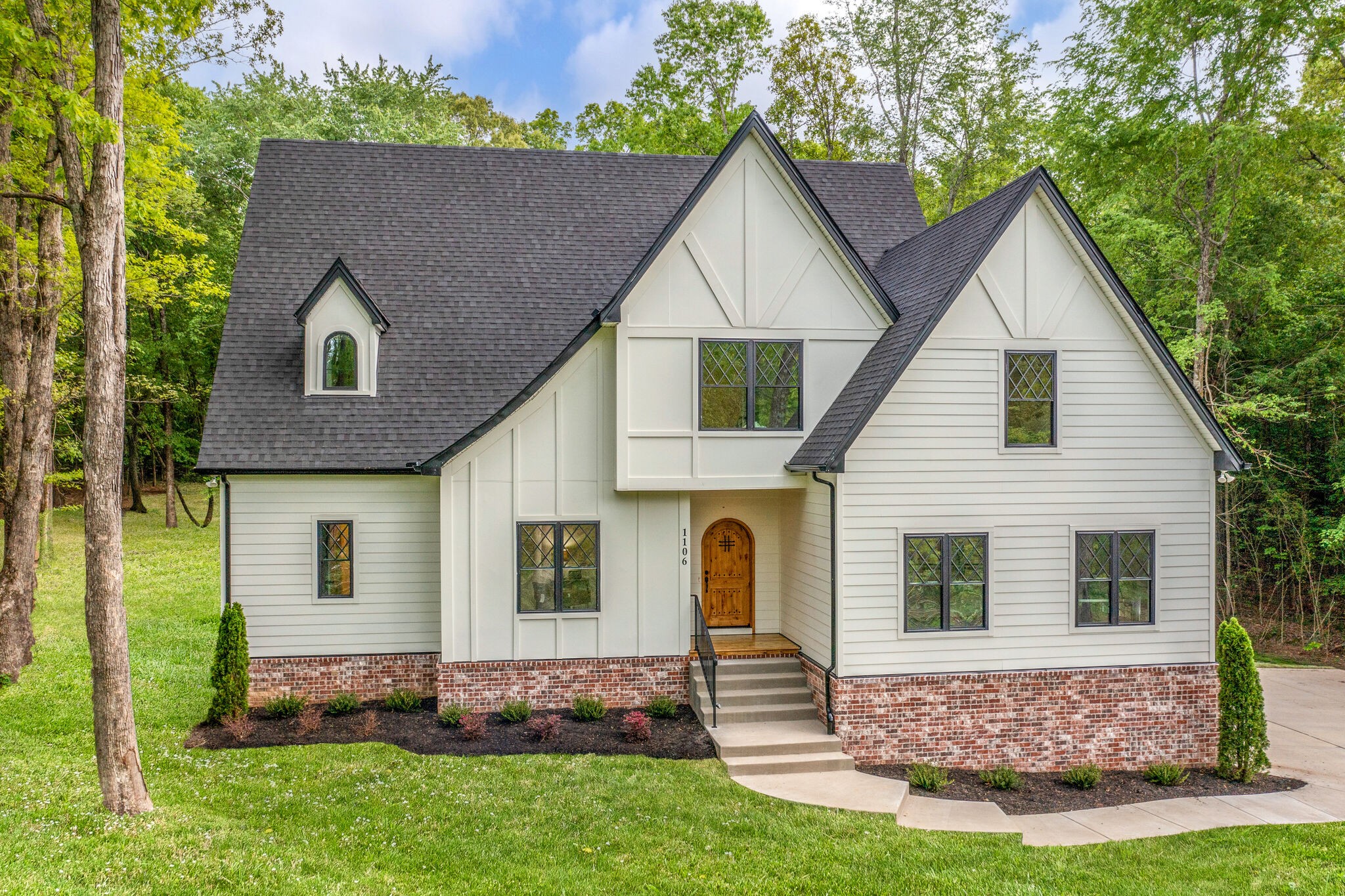1106 Garton Road Burns, TN 37029 - Photo 2 of 46 a view of house with a yard