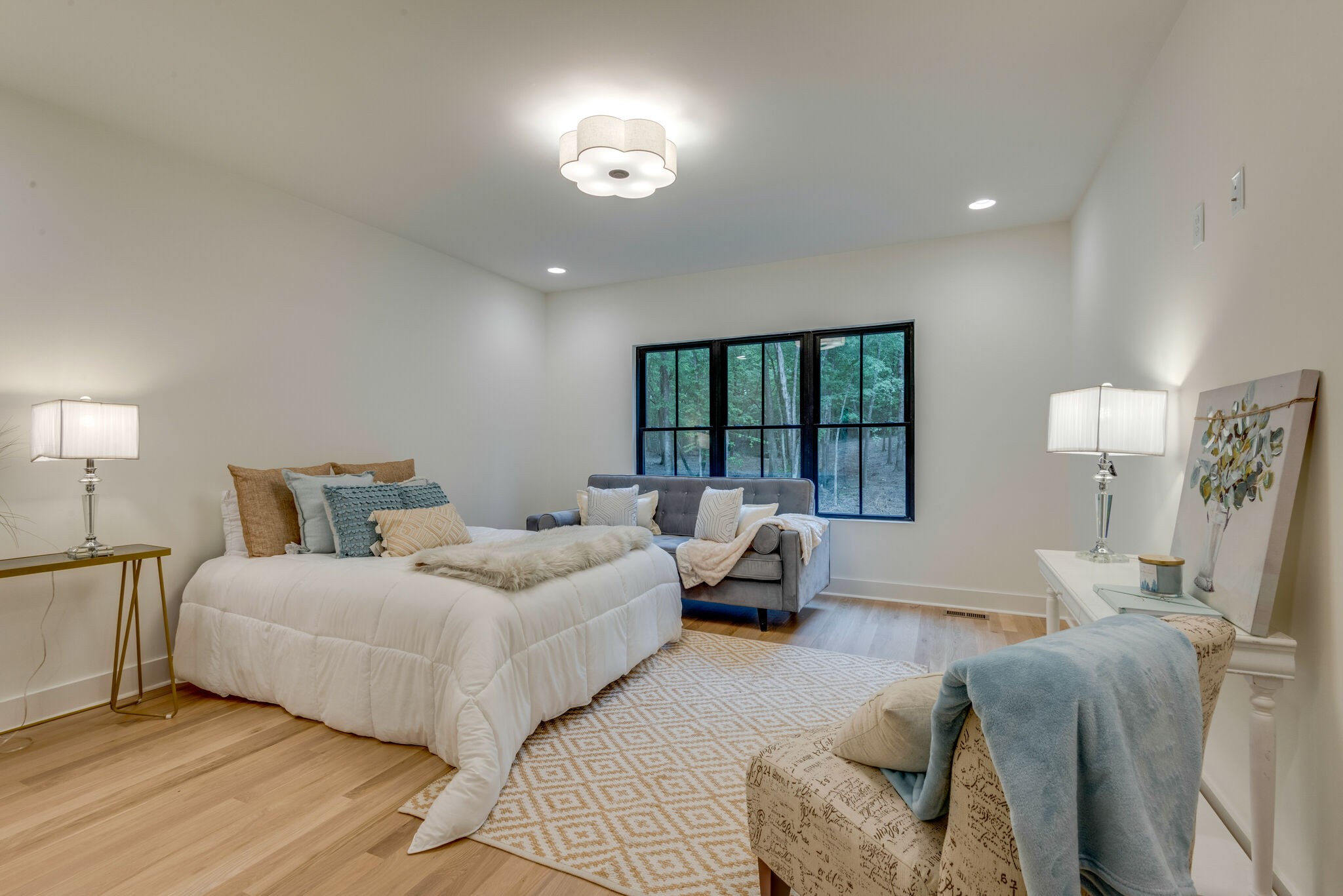 1106 Garton Road Burns, TN 37029 - Photo 21 of 46 a bedroom with furniture and a large window