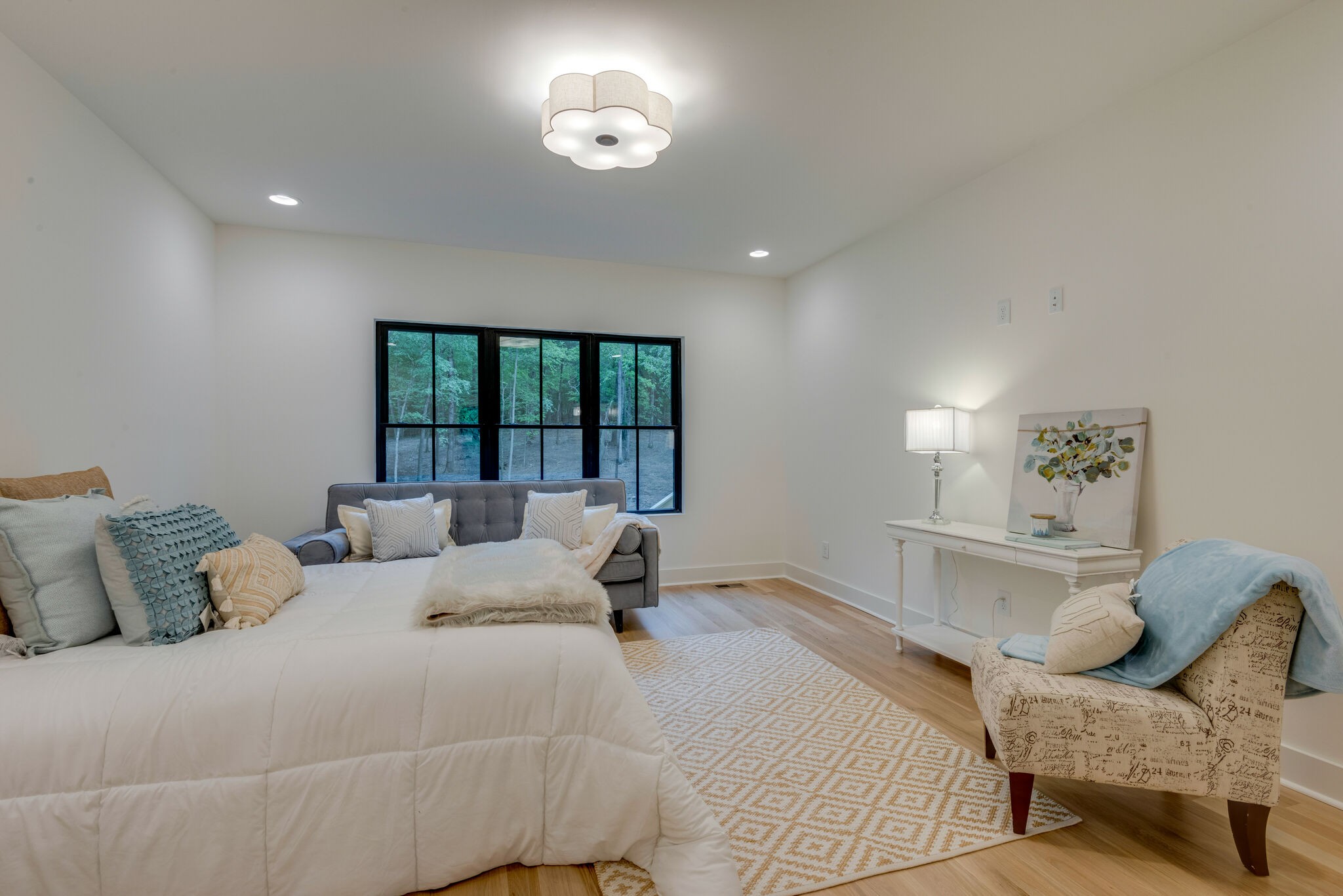 1106 Garton Road Burns, TN 37029 - Photo 22 of 46 a bedroom with a large bed and a window