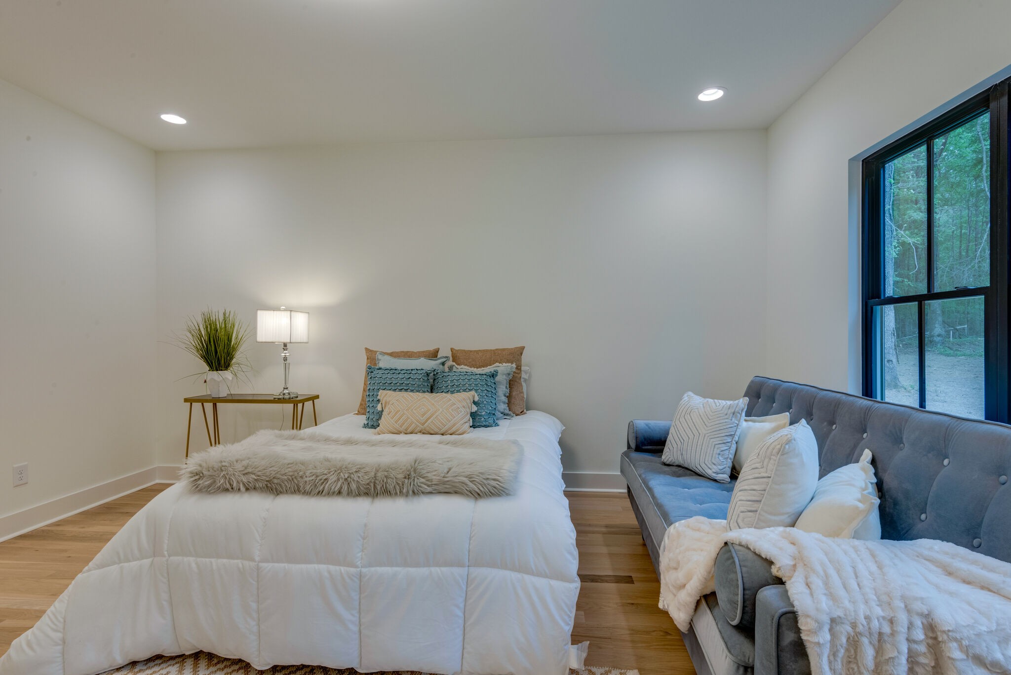 1106 Garton Road Burns, TN 37029 - Photo 23 of 46 a bedroom with a bed and window