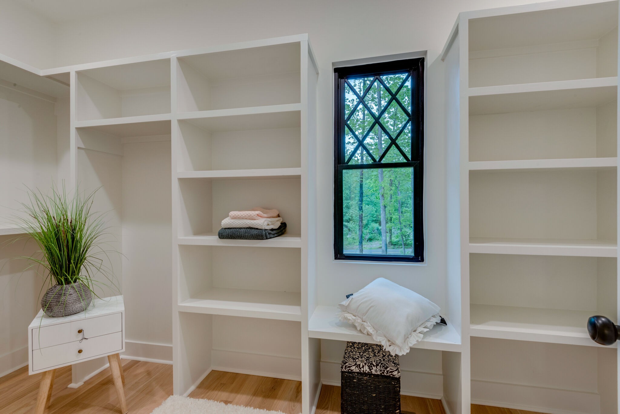 1106 Garton Road Burns, TN 37029 - Photo 25 of 46 a room with a window and potted plant