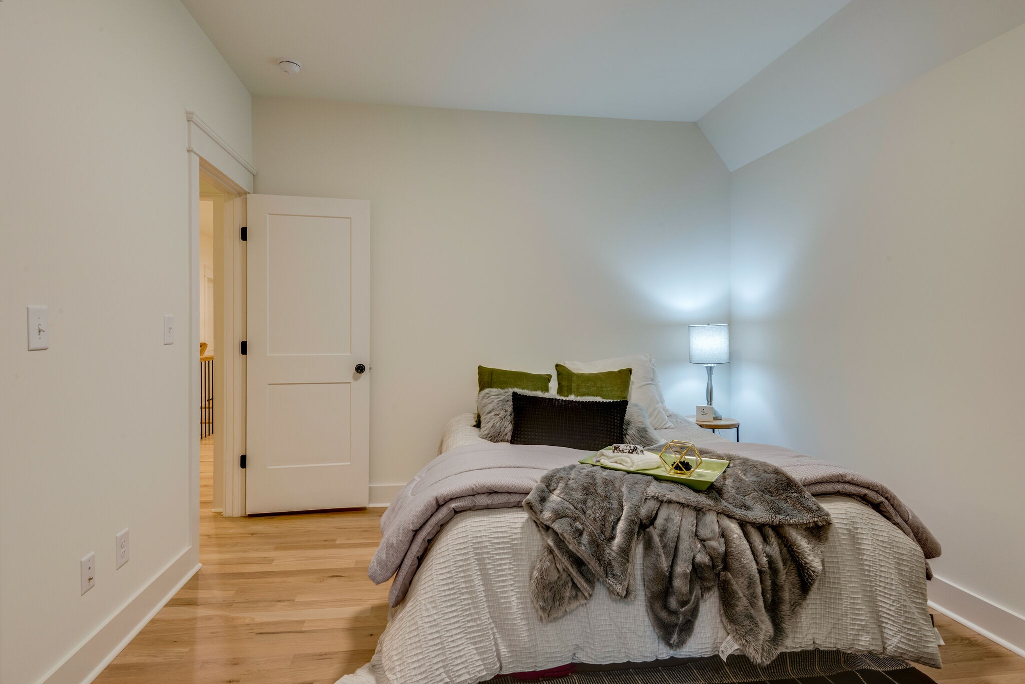 1106 Garton Road Burns, TN 37029 - Photo 28 of 46 a bedroom with a bed and flat screen tv